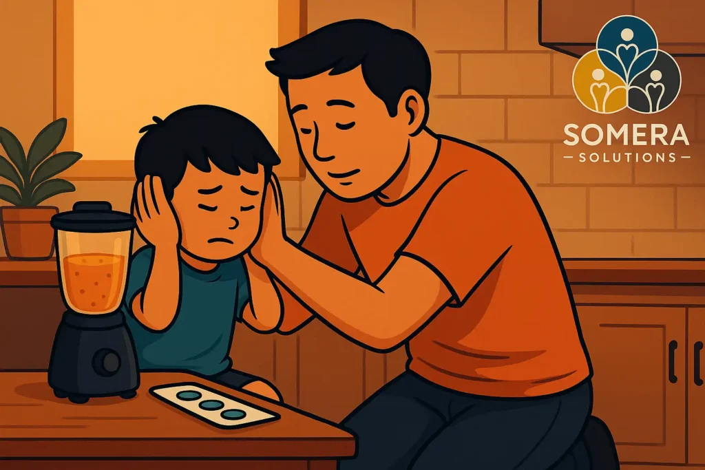 A father trying to calm his son while a blender is near.