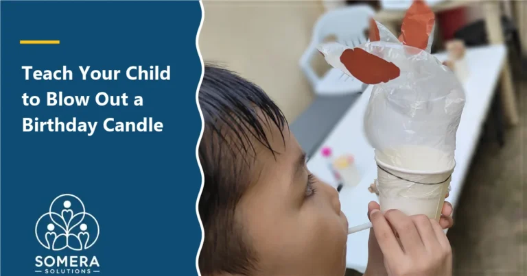 Parent’s hand holding a homemade blowing chicken toy, with the title How to Teach Your Child to Blow Out a Birthday Candle Without Frustration